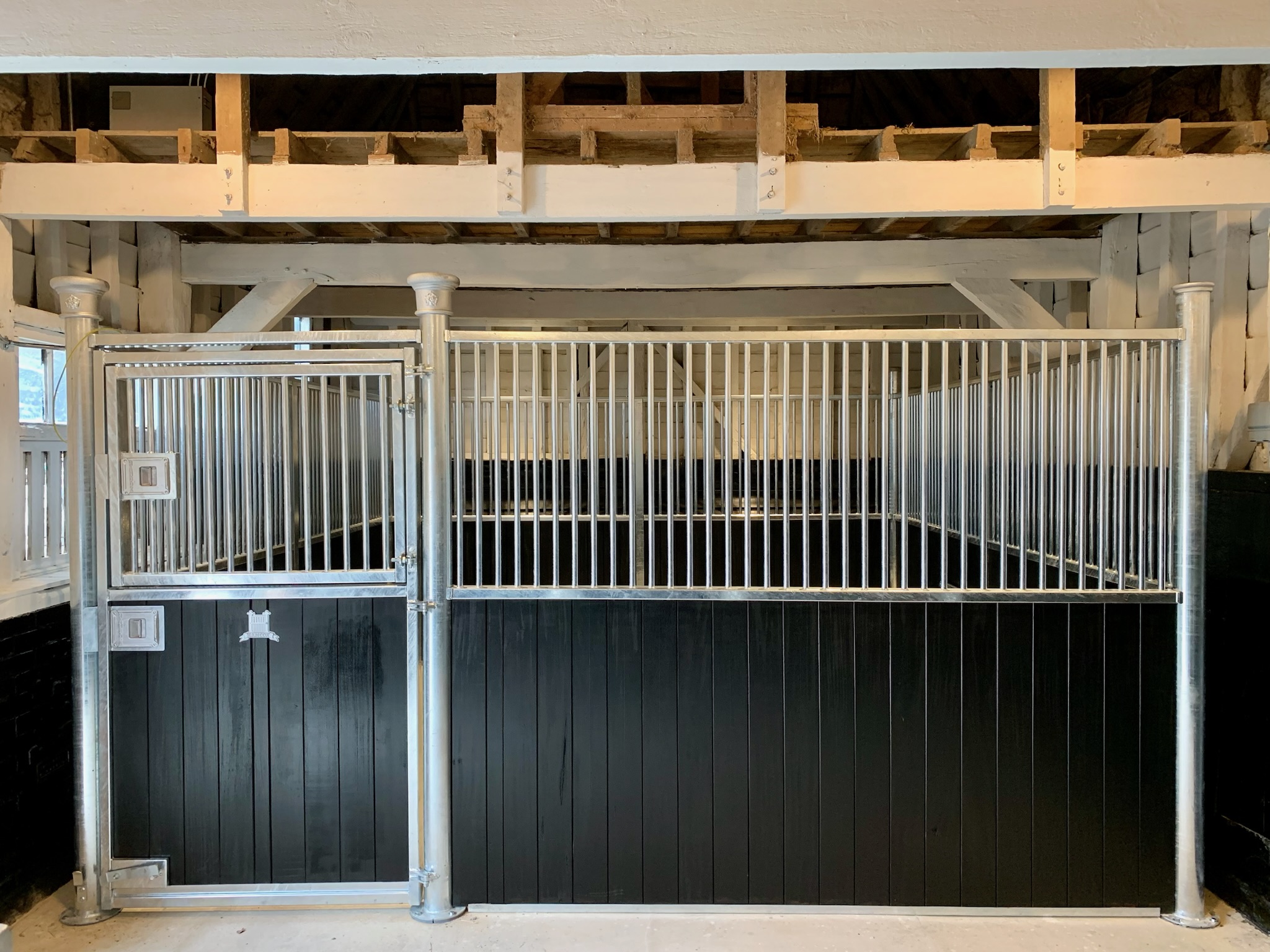 Example of a victorian internal stable with a different coloured infill, this example is black hardwood